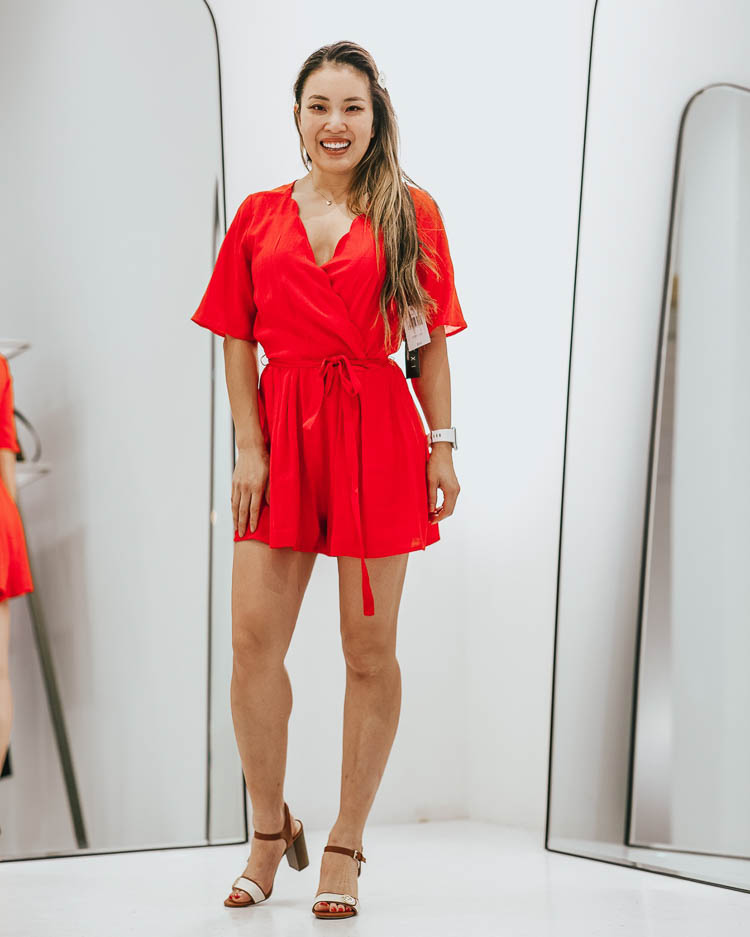 cute & little | dallas petite fashion blog | penney's styling room review | jcpenney spring try-on haul | JCPenney Favorites by popular Dallas fashion blog, Cute and Little:  image of a woman in a JCPenney dressing room wearing a JCPenney Trixxi Short Sleeve Romper, JCPenney Liz Claiborne Womens Nihoa Heeled Sandals, and Amazon Pearls Hair Clips for Women.