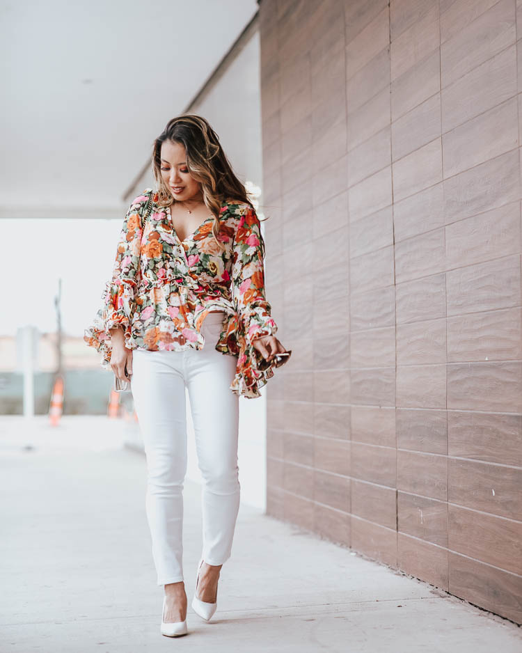 cute & little | dallas petite fashion blog | floral bell sleeve blouse, jen7 jeans | spring transition outfit | Spring Florals by popular Dallas petite fashion blog, Cute and Little: image of a woman wearing a SheIn SHEIN Floral Print Flounce Sleeve Peplum Top, JEN7 by 7 For All Mankind Cropped Skinny Jeans in White, Amazon Gucci GG 0106 S- 002 002 HAVANA / BROWN / GOLD Sunglasses, Just Fab white heels, and James Avery Mini Heart Charm.