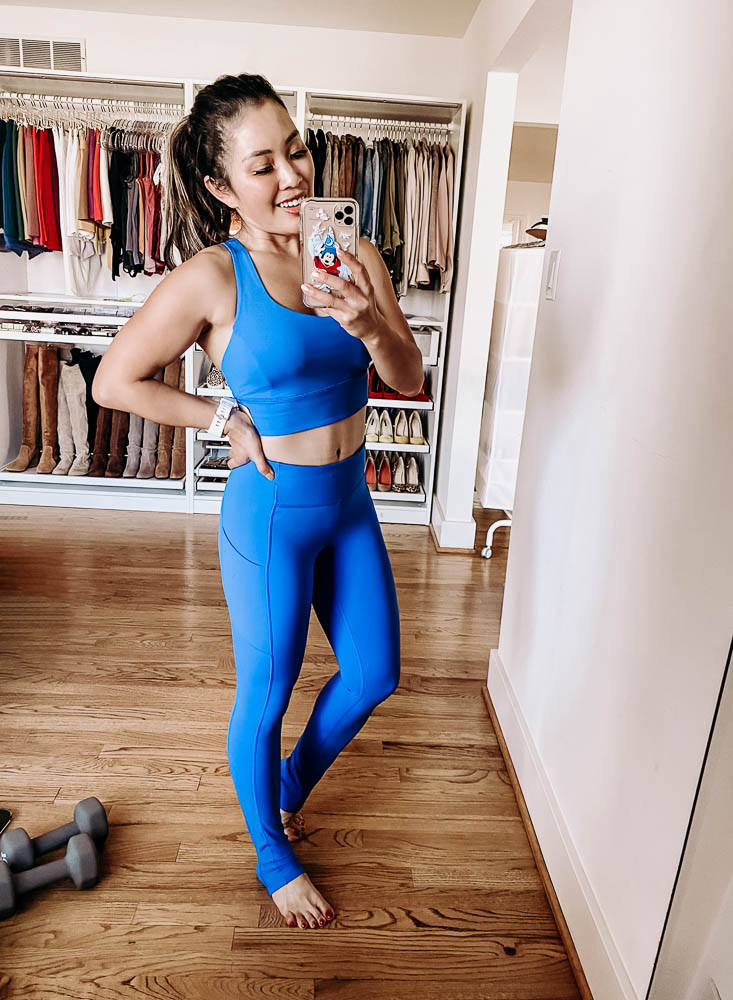 cute & little | dallas fitness lifestyle blogger | at home workouts |  Best Online Home Workouts by popular Dallas lifestyle blog, Cute and Little: image of a woman wearing a Lululemon Free To Be Serene Bra Long Line Light Support and Lululemon Speed Up Tight 28".