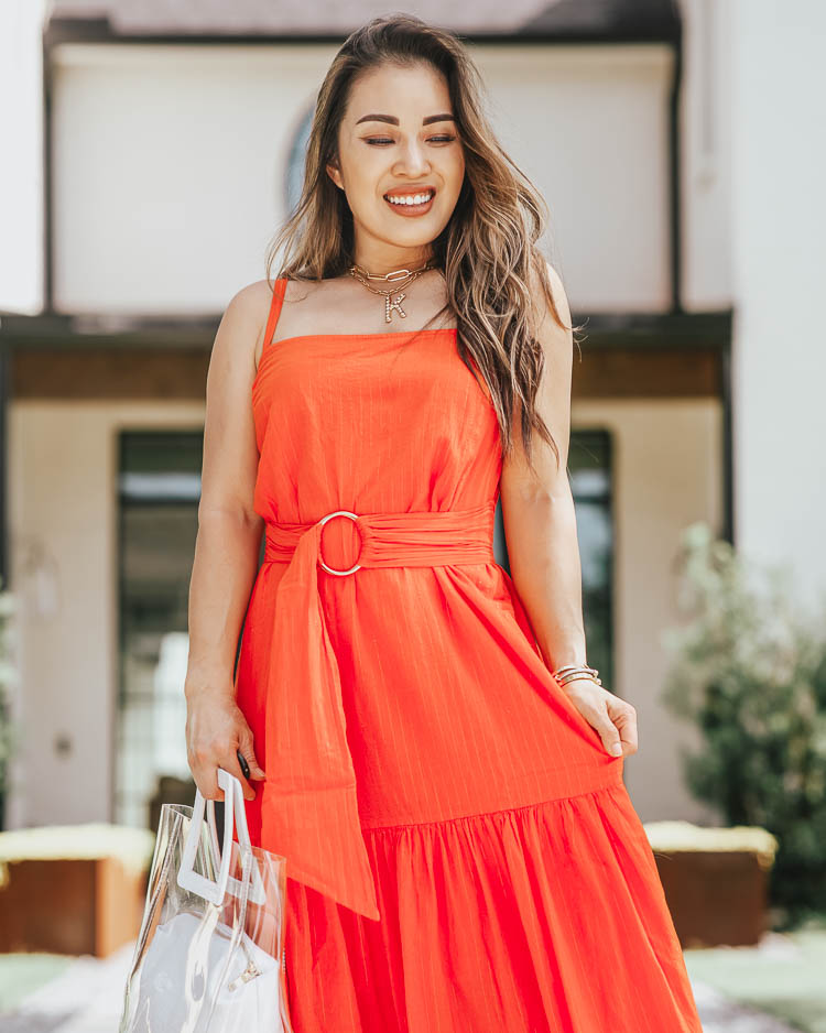 cute & little | dallas petite fashion blog | amazon big style sale | red tiered maxi dress, soludos platform espadrilles | Amazon Big Style Sale 2020 by popular Dallas petite fashion blog, Cute and Little: image of a woman walking outside and wearing a Amazon Nation LTD Anais Dress, Amazon Soludos ‘Ali’ Sport Sandals, Amazon Clear Tote, and Sequin NYC Initial Pendant Baublebar ‘Hera’ Link.