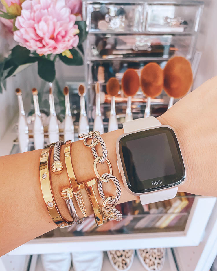 cute & little | dallas petite fashion blogger | ltk day 2020 sale picks | the styled collection | designer jewelry david yurman cartier dupe | Like To Know It by popular Dallas life and style blog, Cute and Little: image of a woman wearing the Styled Collection bracelets and a FitBit watch. 