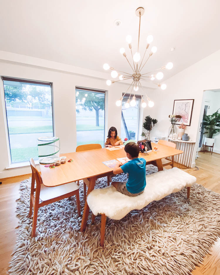 cute & little | dallas mom lifestyle blog | back to school organization homeschooling | Homeschool Organization by popular Dallas motherhood blog, Cute and Little: image of two kids sitting at a table and doing homeschool work. 