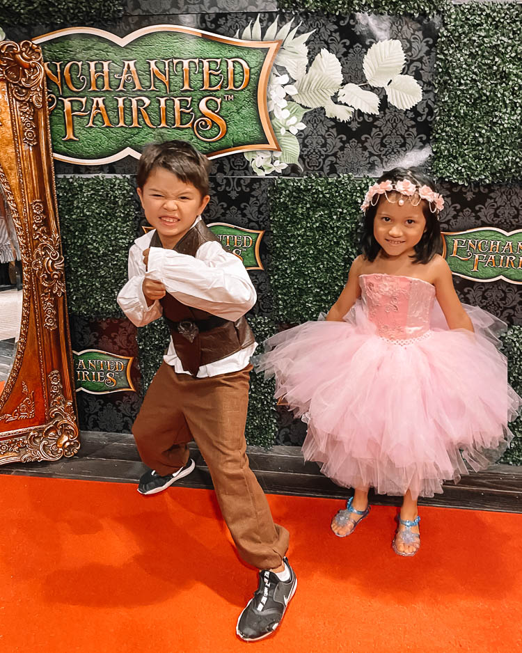 cute & little | dallas mom blog | enchanted fairies storybook studio photography review | behind the scenes | Enchanted Fairies by popular Dallas lifestyle blog, Cute and Little: image of a boy dressed up in medieval clothing and a girl dressed up as a fairy at Enchanted Fairies. 