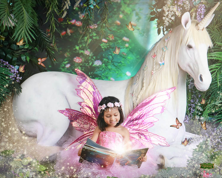 cute & little | dallas mom blog | enchanted fairies storybook studio photography review | unicorn fairy dfw photo | Enchanted Fairies by popular Dallas lifestyle blog, Cute and Little: image of a girl dressed up as a fairy and sitting in front of a life size unicorn statue while reading a picture book. 