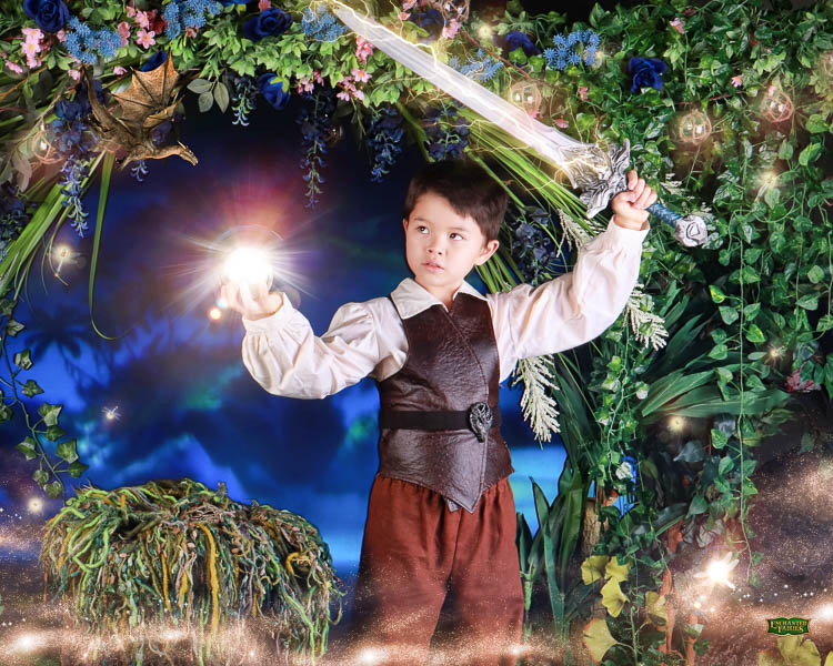 cute & little | dallas mom blog | enchanted fairies storybook studio photography review | warrior costume | Enchanted Fairies by popular Dallas lifestyle blog, Cute and Little: image of a boy dressed up in medieval clothing and holding a sword. 