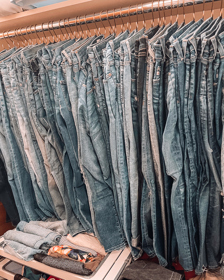 cute & little | dallas petite fashion blog | walmart beauty self care products must-have | jean S hooks |Amazon Organization Essentials by popular Dallas lifestyle Cute and Little: image of jeans hanging on Amazon jean s hooks. 