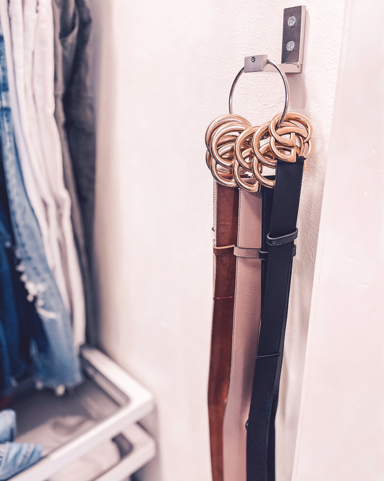 cute & little | dallas petite fashion blog | walmart beauty self care products must-have | belt binder ring hanger |Amazon Organization Essentials by popular Dallas lifestyle Cute and Little: image of belts hanging on a belt binder ring hanger. 