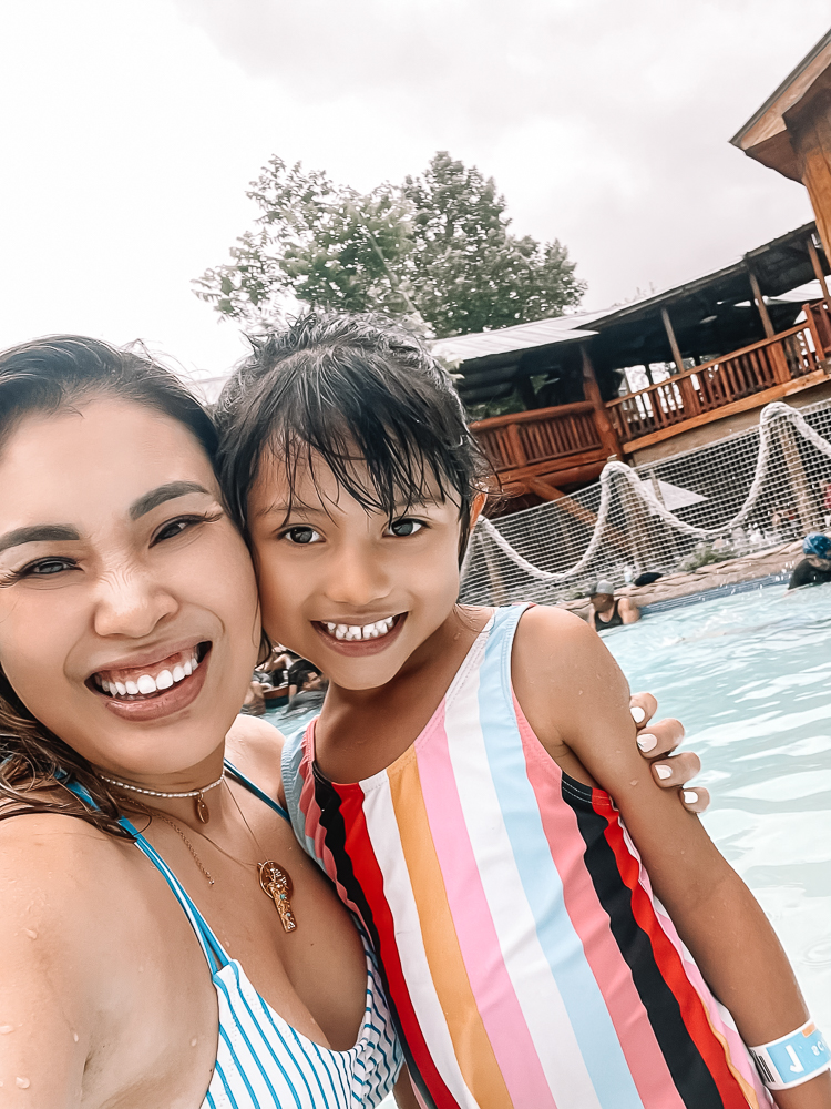 cute & little | dallas mom family travel blog | schlitterbahn new braunfels review tips | Schlitterbahn Waterpark by popular Dallas travel blog, Cute and Little: image of a mom and her young daughter playing together in the water at Schlitterbahn Waterpark. 