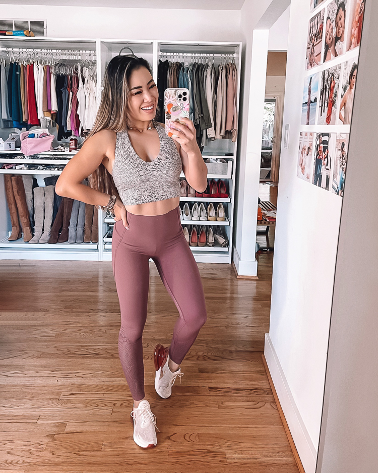 cute & little | dallas petite fashion fitness blogger | spanx booty boost every wear laser wave leggings review, spanx longline sports crop | workout outfit | But Lifting Leggings by popular Dallas petite fashion blog, Cute and Little: image of a woman wearing a grey crop sports bra and mauve Spanx booty boost every wear knockout leggings.