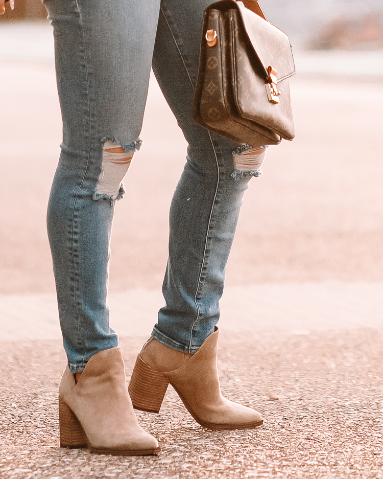 cute & little | dallas petite fashion blogger | Nordstrom Anniversary Sale shoes | Nordstrom Anniversary Sale by popular Dallas petite fashion blog, Cute and Little: image of a woman standing in a street and wearing a Nordstrom distressed light wash jeans, tan suede ankle boots, and holding a Louis Vuitton bag. 